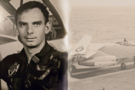 person in military uniform along side a plane 