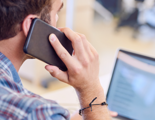 Talking on the phone with computer open