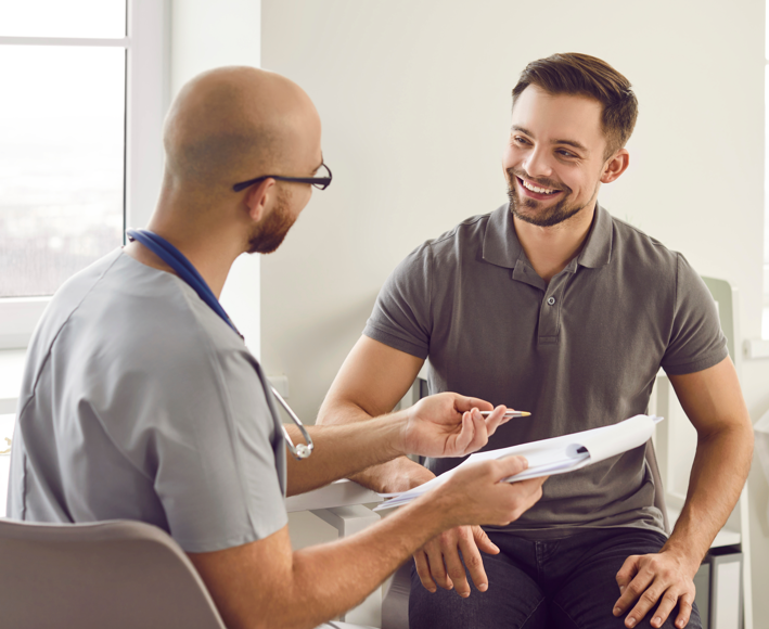 Man talking with a medical provider