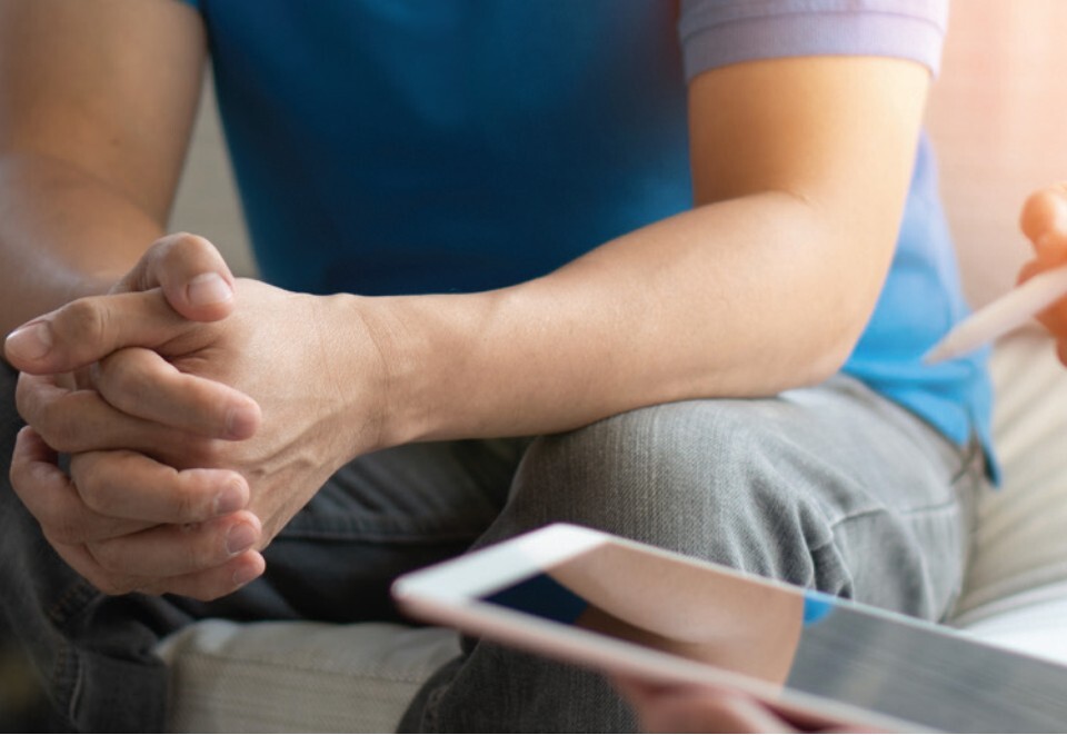 Two people with a tablet