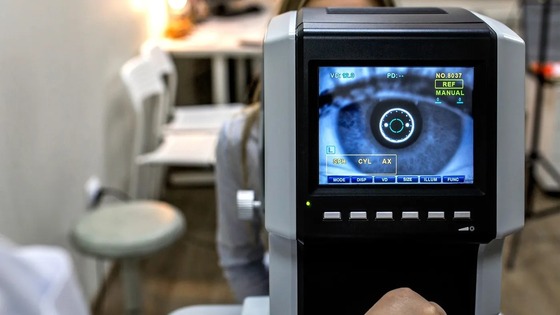 Close-up of an eye undergoing a detailed digital eye examination.