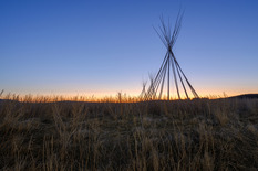 Tipi lodge tent frame in a landscape photograph