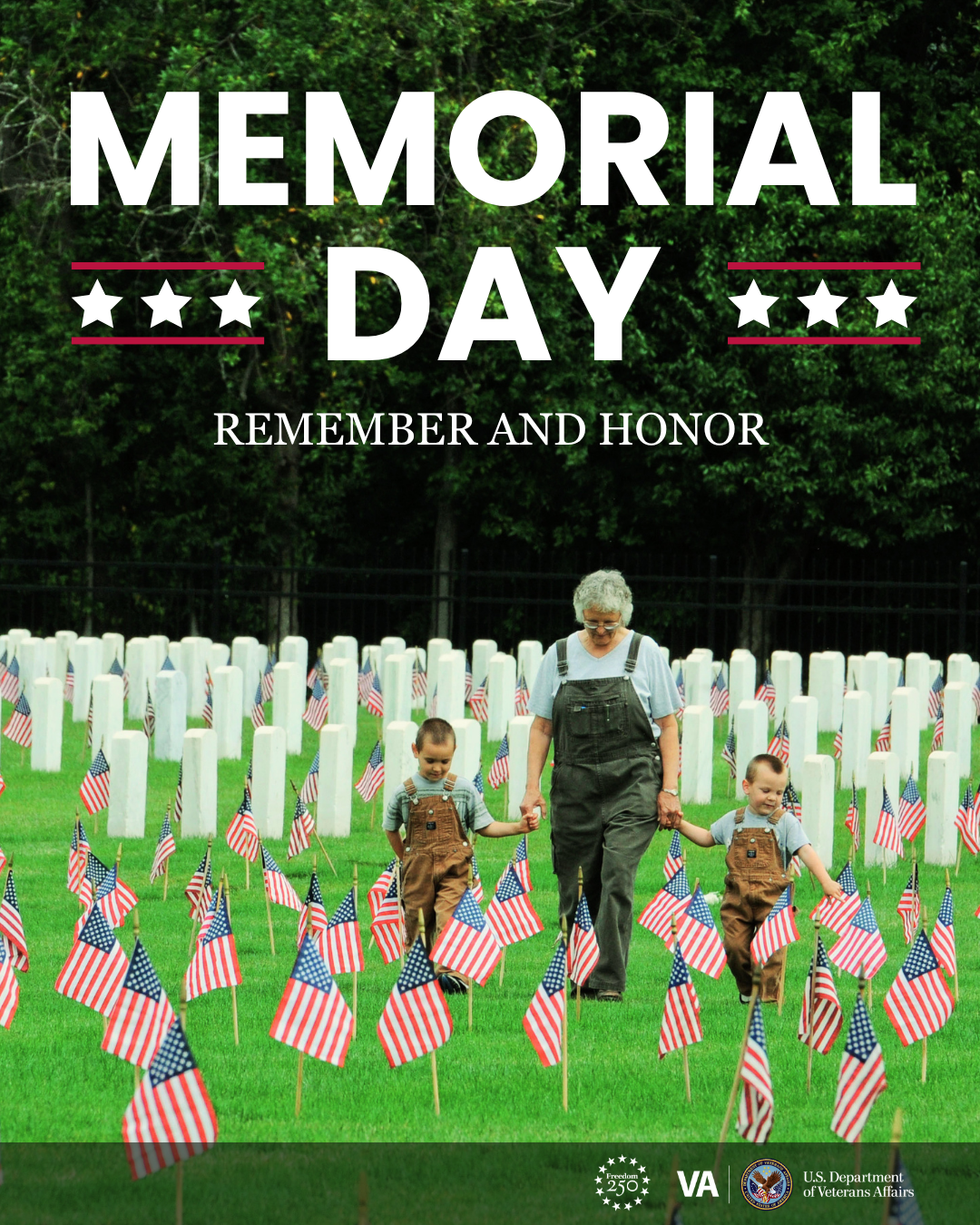 Older woman walking through Veteran cemetery with two small children