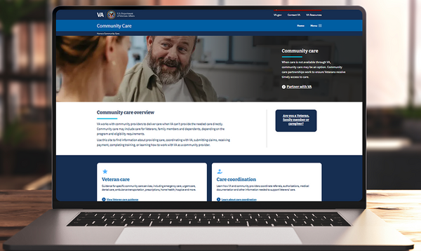 Laptop with the new community care provider website on the screen.