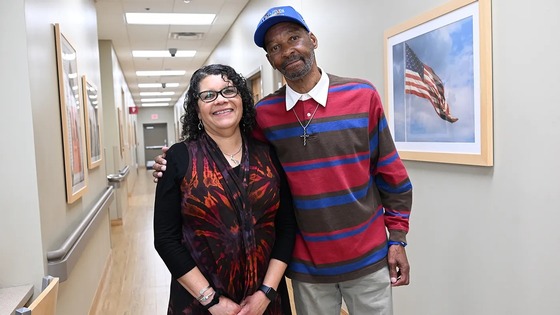 George Bryant Jr posing with a woman