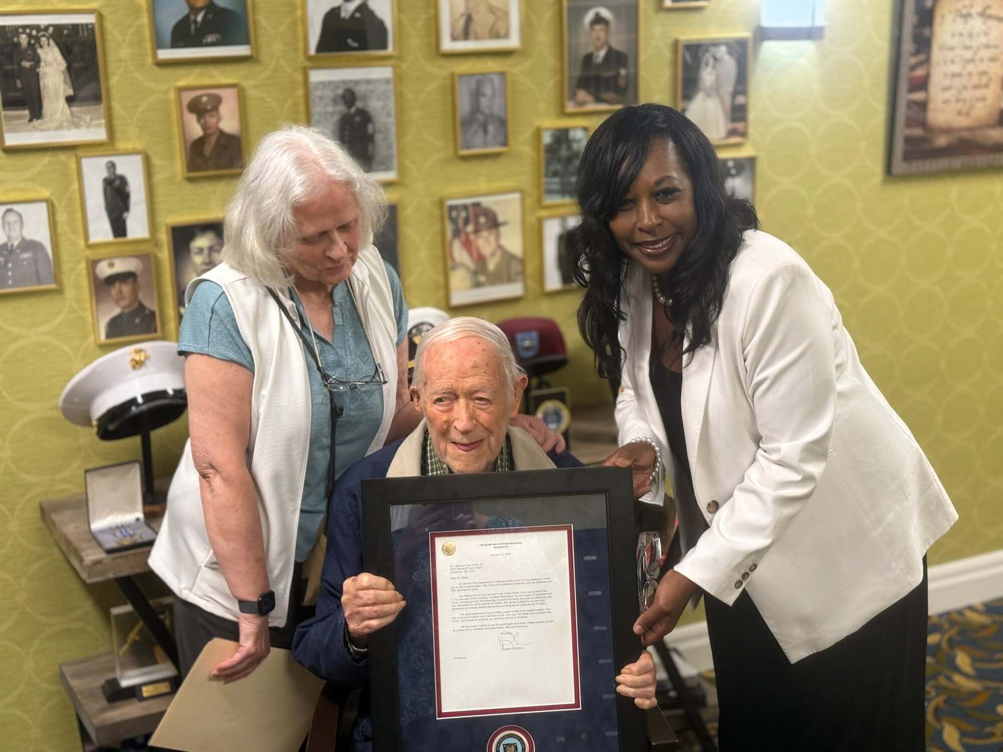 CAVHCS Interim Director and CEO Laundrena LaPradd-Bradley and Linda Stein recognize World War II Veteran Lawrence Skeet Miner Jr.