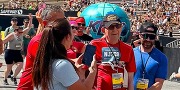 Army Veteran Mark Maloney with a group of runners smiling.