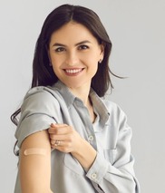 woman with band aid on arm
