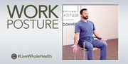 Man in scrubs demonstrating proper seated work posture with arms relaxed on chair sides in a wellness setting.