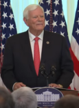 Chairman Hamby speaking at podium in The White House