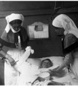 Nurses attending patient WWI