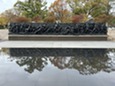 A Soldier's Journey sculpture daytime reflection on scrim