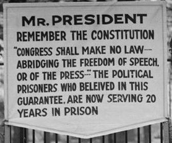 Espionage Act protest sign