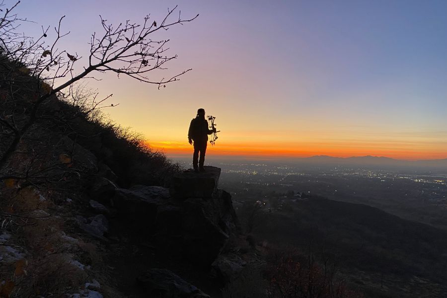 archery hunt at sunset