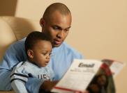 Father and son reading