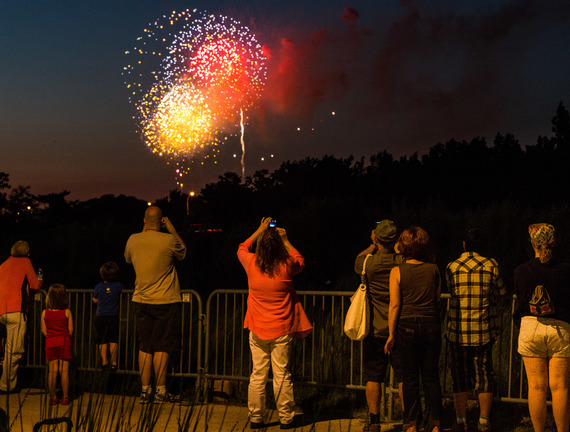 image of people watching fireworks at long bridge park