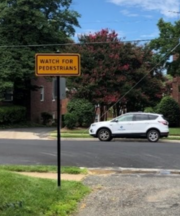 Street sign reads "Watch for Pedestrians"