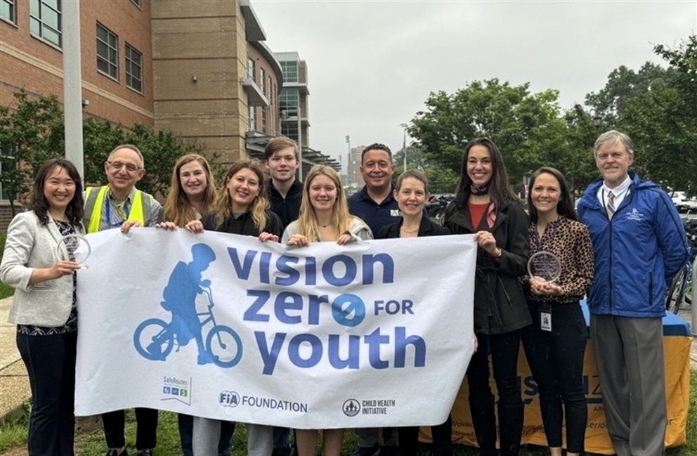 Image of County Staff and other partners accepting the Vision Zero for Youth award