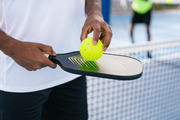 guy playing pickleball