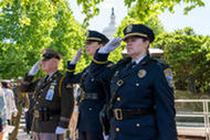 Honor Guard saluting at the National Peace Officers Memorial Service.