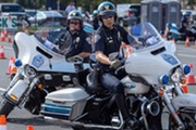 Two police officers on their bikes participating in the Motorcycle Rodeo