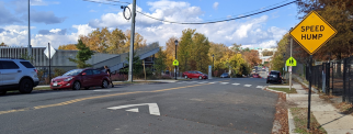ID: Image of a speed cushion in front of Lubber Run Community Center