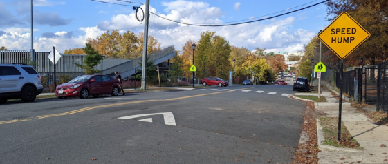 ID: Image of a speed cushion in front of Lubber Run Community Center