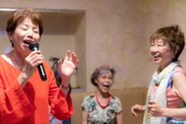 Woman singing karaoke.