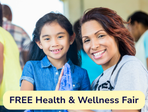 A school-aged child and an adult healthcare worker. A yellow banner reads: “FREE Health & Wellness Fair.”