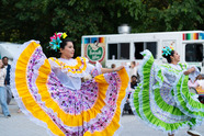 Performers dancing at the Festival Latinoamericano