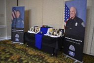 A memorial table for Corporals Snook and Foust at the ACPD Remembers event.