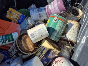 Assorted paint cans and other household hazardous materials at an E-CARE event.