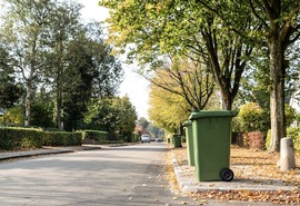 A recycling container left out by the curbside for collection