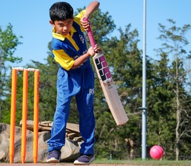 A young boy demonstrates how to play cricket at Chesterfield's new Beulah Park