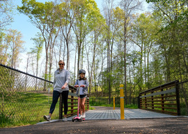 A woman and her daughter use the new connector trail near Chesterfield's Mary B. Stratton Park