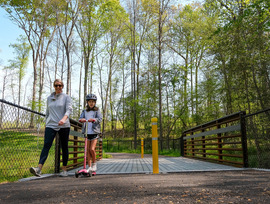 A woman and her daughter use the new connector trail near Chesterfield's Mary B. Stratton Park