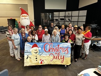Group of people at Annual Christmas in July Event at Winfree Church