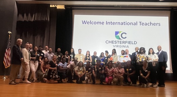 Picture of international teachers on stage at  2025 International Teachers Welcome Reception