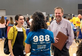 People talking at Regional Recovery Day at the Henrico Sports and Events Center