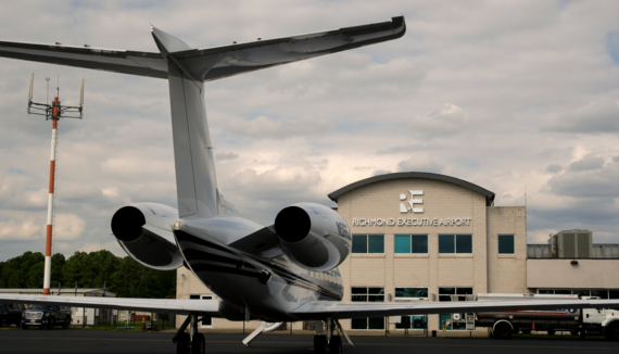 A private jet is parked on the tarmac outside Richmond Executive-Chesterfield County Airport