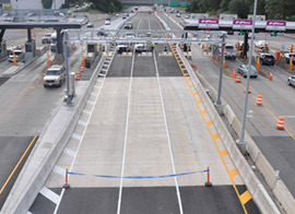 Vehicles proceed through the toll plaza on Richmond's Downtown Expressway