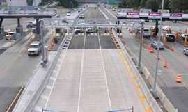 Vehicles proceed through the toll plaza on Richmond's Downtown Expressway