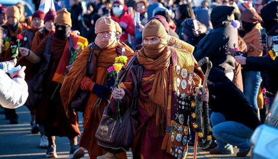 Buddhist monks walking through Chesterfield