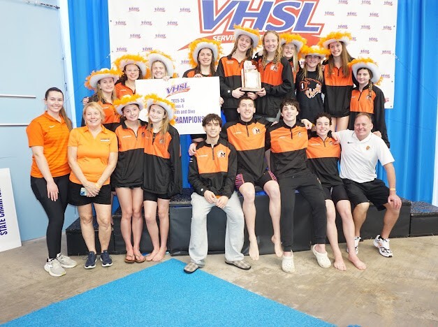 Monacan High School swimmers celebrate their fifth consecutive VHSL Class 4 state championship