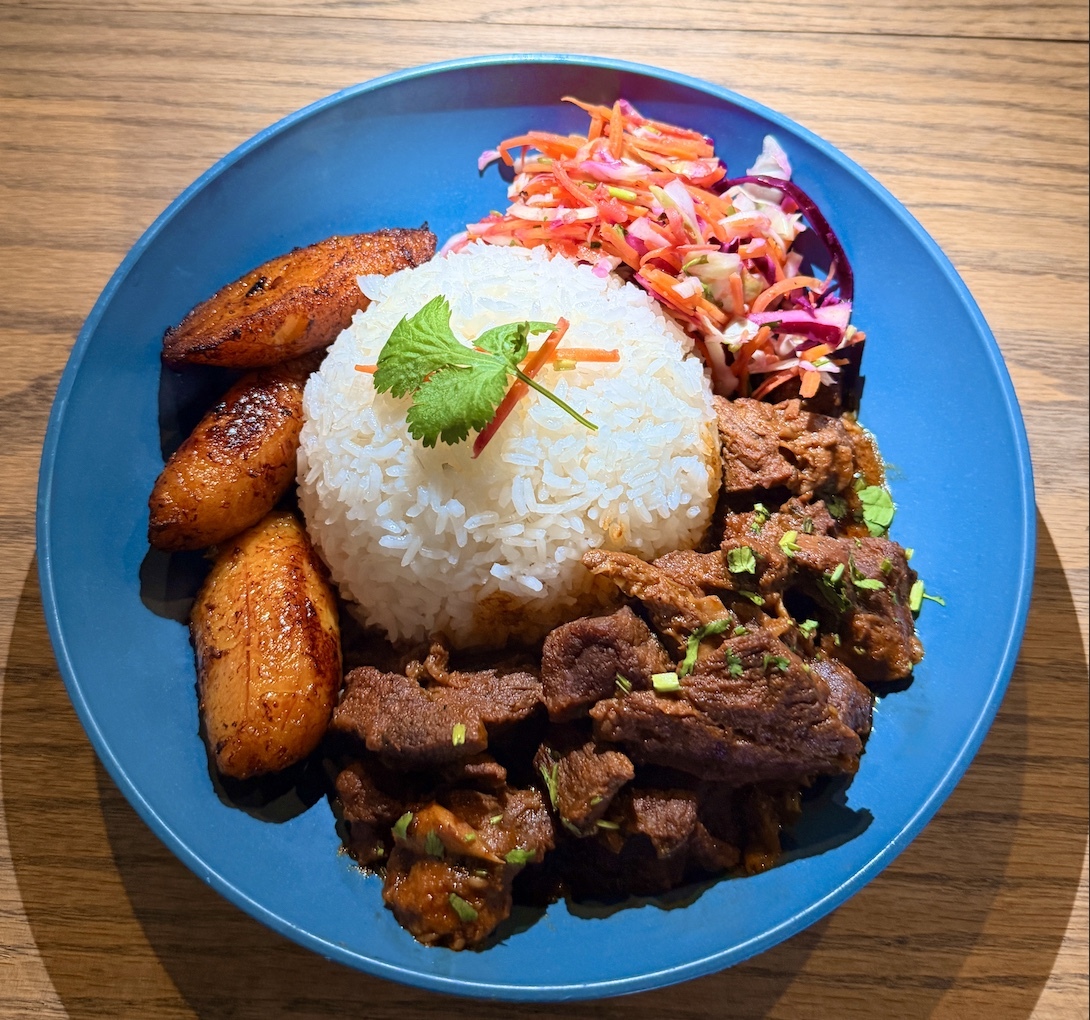 A plate of beef and rice