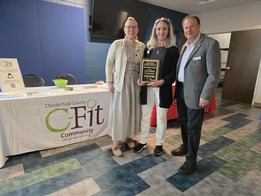 Lynne Winfield receiving Pat Cullen Award with Jessica Schneider and Dr. Mark Miller