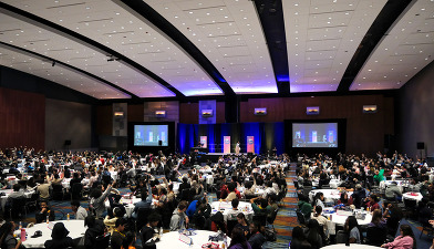 Large room with participants at Teen Summit Event
