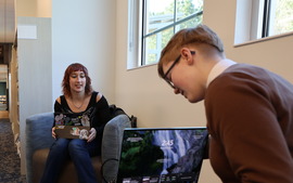 teens on laptops at library