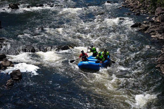 Chesterfield Fire and EMS' Scuba Rescue team navigates white water in a four-person inflatable raft