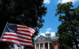 An American Flag Waves in Front of the Historic 1917 Courthouse